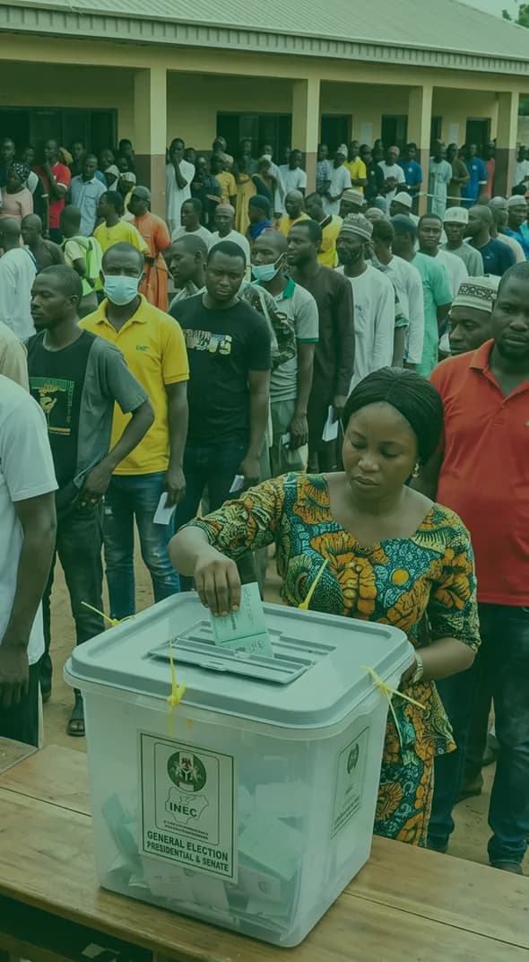 Voter casting a ballot at a Nigerian polling unit