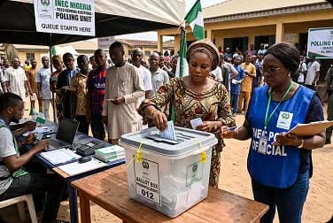 Voter casting a ballot at an INEC polling unit during Nigerian elections